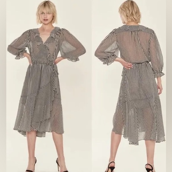 Revolve ICONS Swiss Dot Flamenco Wrap Dress - Picture 9 of 14